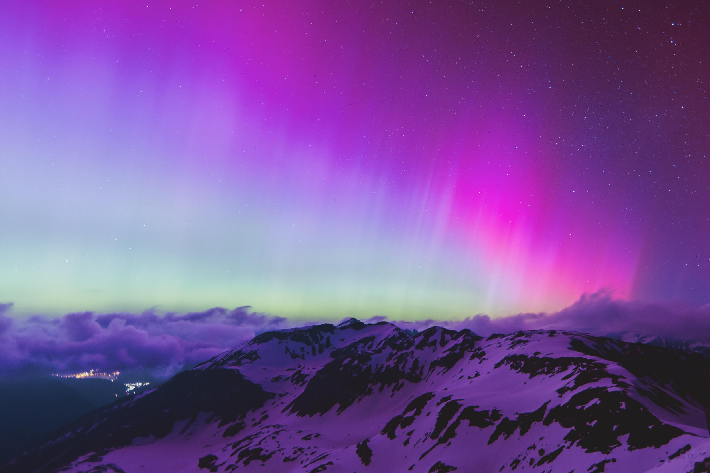 Northern lights over mountains in Austria.