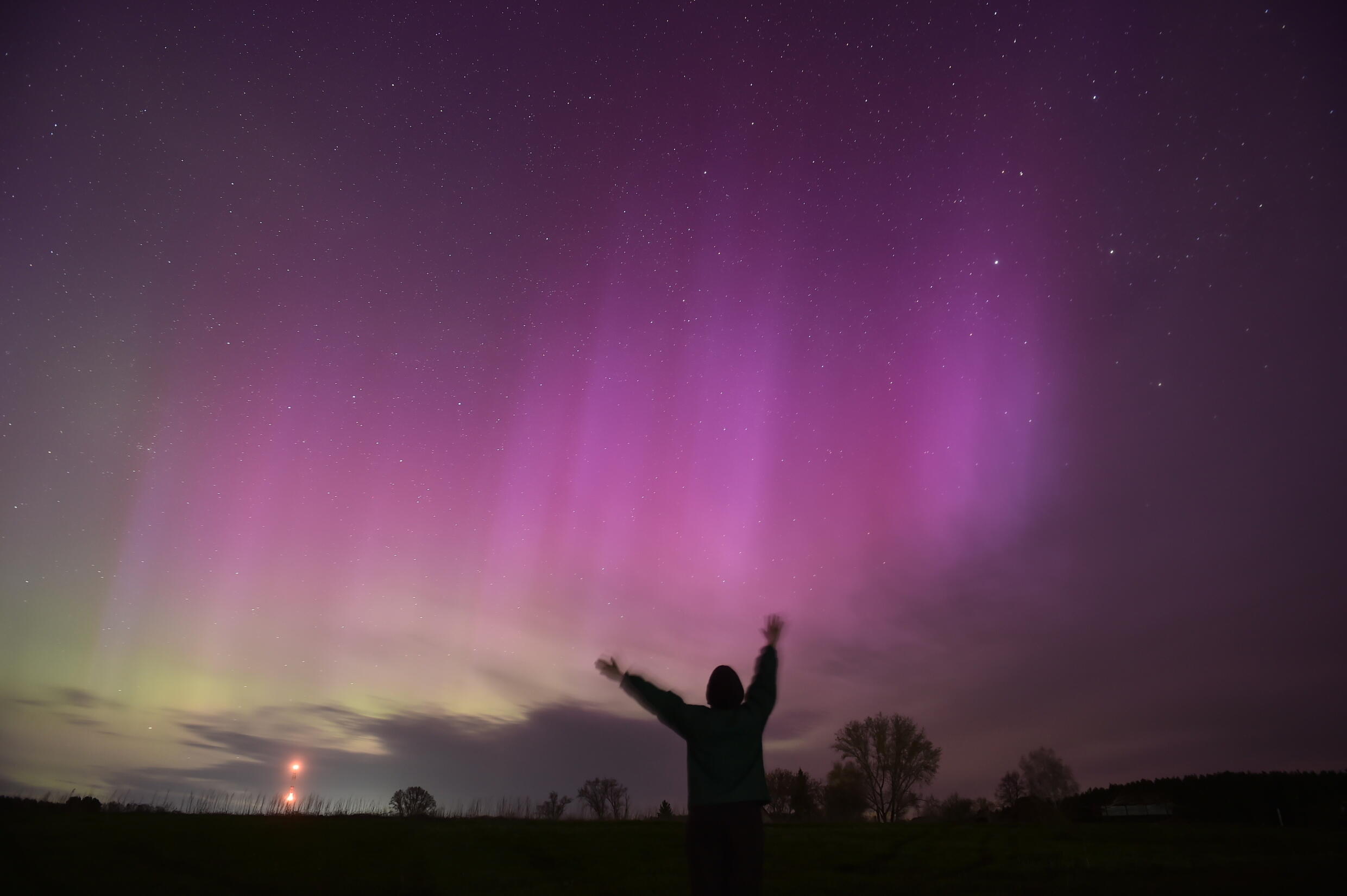 The most powerful solar storm to hit our planet in more than two decades has caused dazzling auroras in many nations, including Russia.