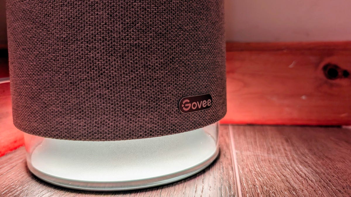 Close-up image of Govee Floor Lamp Pro base with glowing white light.