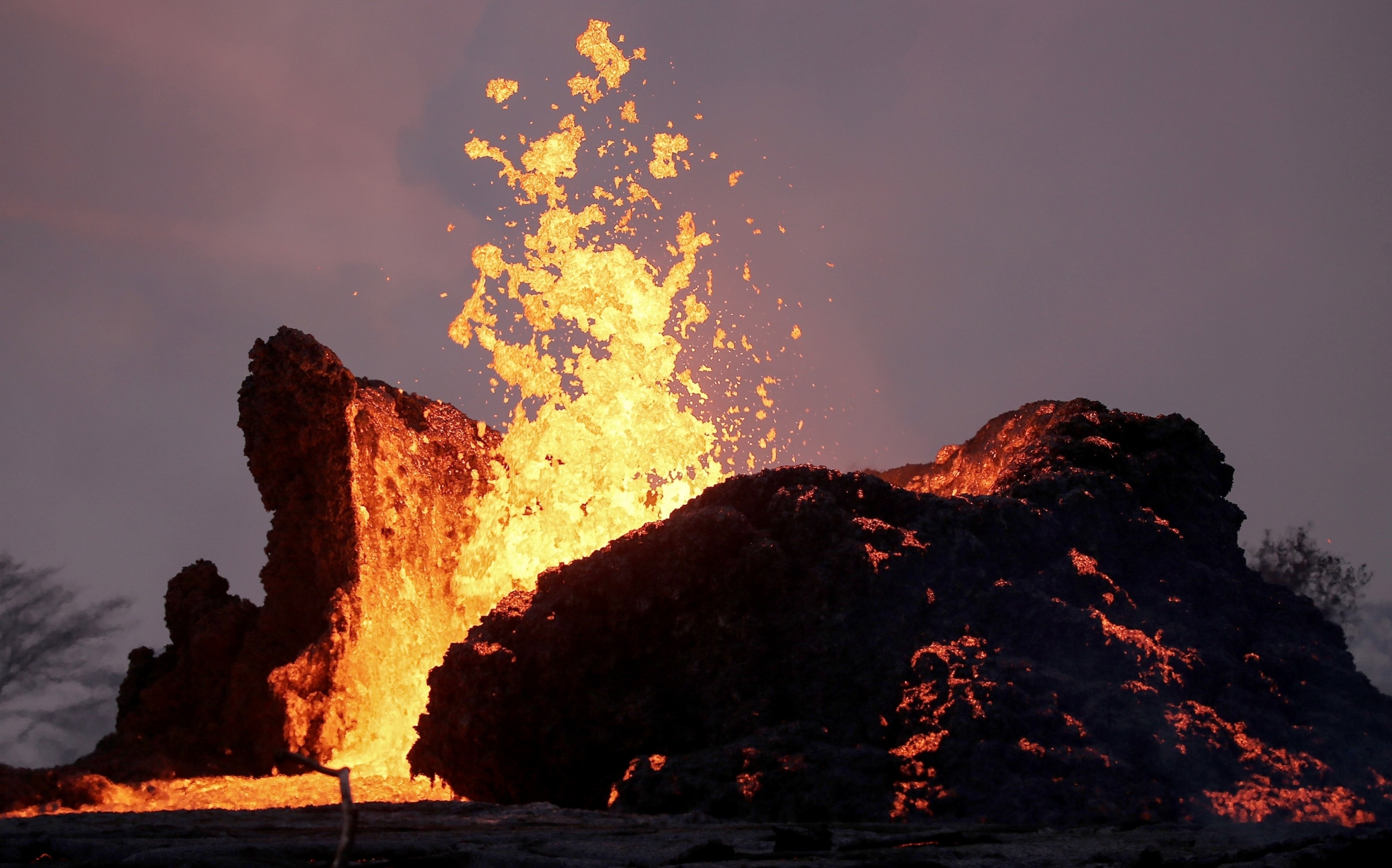 PHOTO: Lava erupts and flows from a fissure at Kilauea Volcano in Leilani Estates, on the Big Island of Hawaii, on May 23, 2018 in Pahoa, Hawaii.