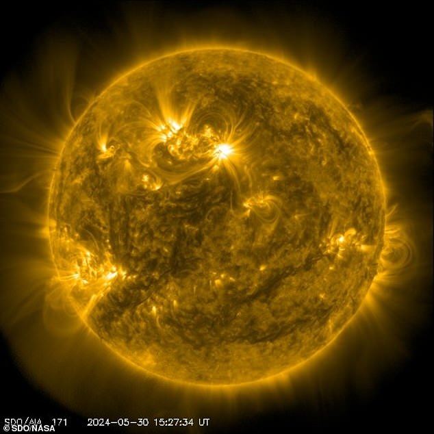 The sunspot has completed a full rotation of the sun, spinning back toward Earth for what appears to be a few more active days.