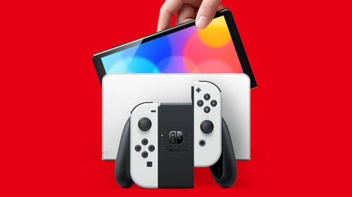 The Switch Oled is located in the right background.