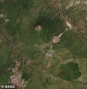 Above, a 2016 NASA satellite image of the widening Batagayka Crater