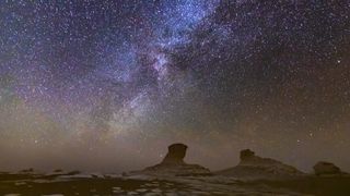 Beautiful starry night sky over desert landscape in White Desert.  Egypt