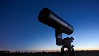 Used telescope against the background of the starry sky