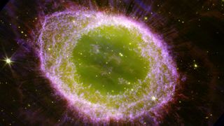 pink and green cloud of gas in space