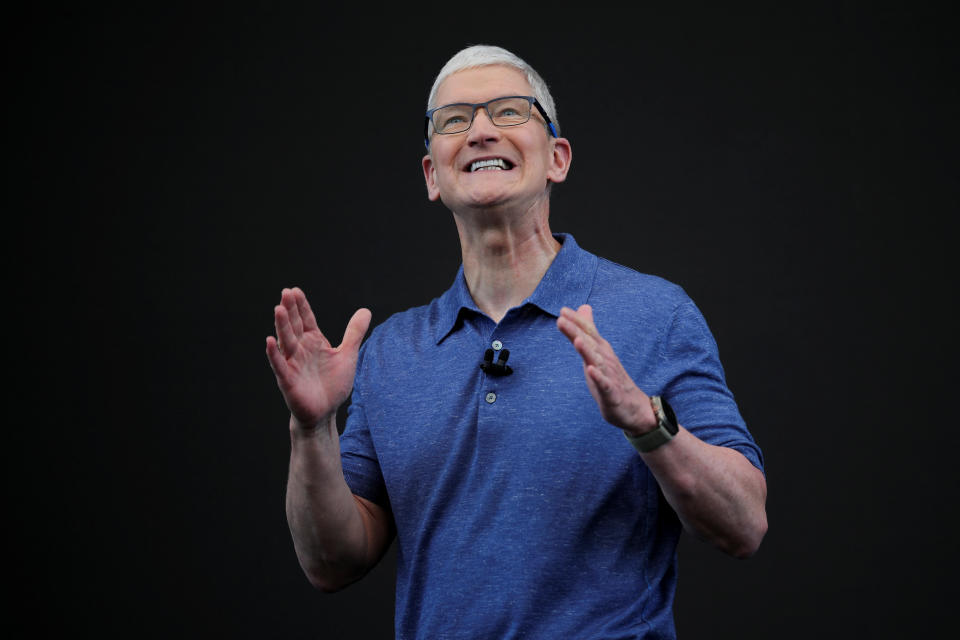 Apple CEO Tim Cook attends the annual developer conference at the company's headquarters in Cupertino, California, U.S., June 10, 2024. REUTERS/Carlos Barria