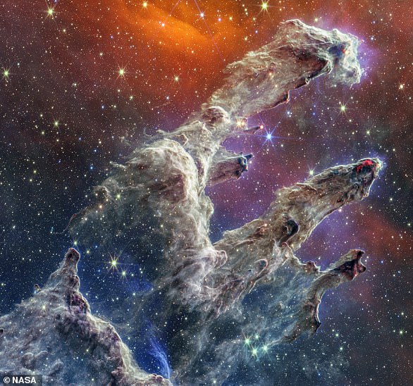 Resembling a ghostly hand, the Pillars of Creation are part of the Eagle Nebula - which is 6,500 light-years from Earth - and are known to be a source of star formation