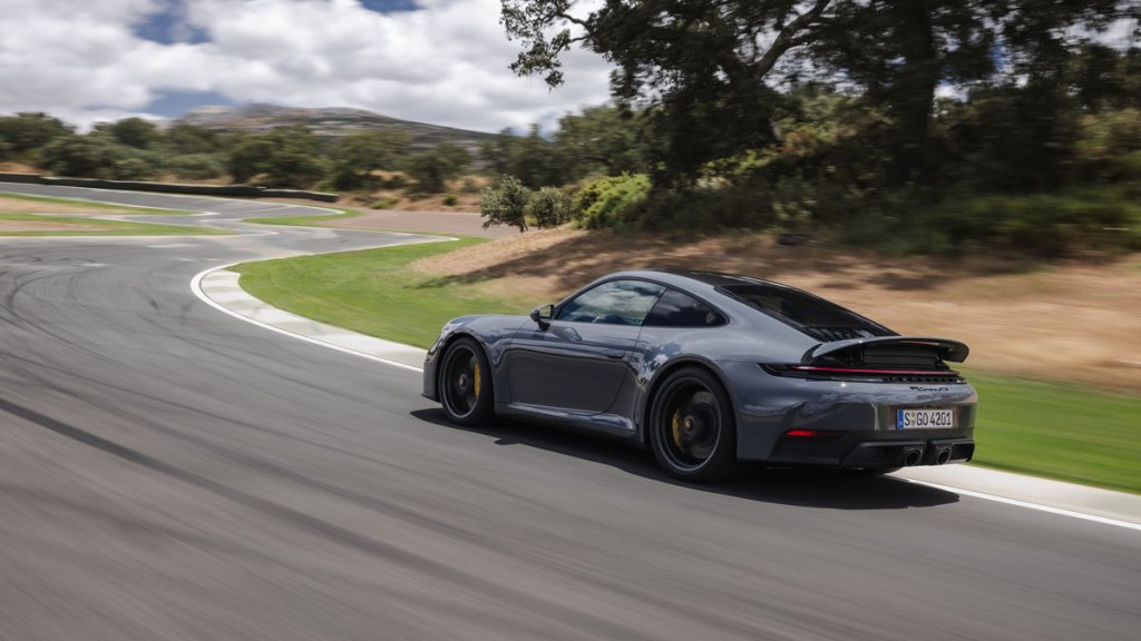 Driving the hybrid Porsche 911 Carrera GTS on the track.