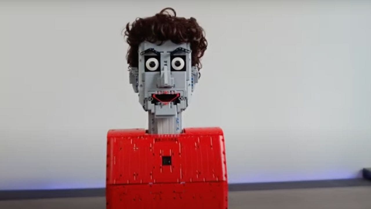 Read more about the article Would you like to talk to this creepy looking AI powered Lego head?