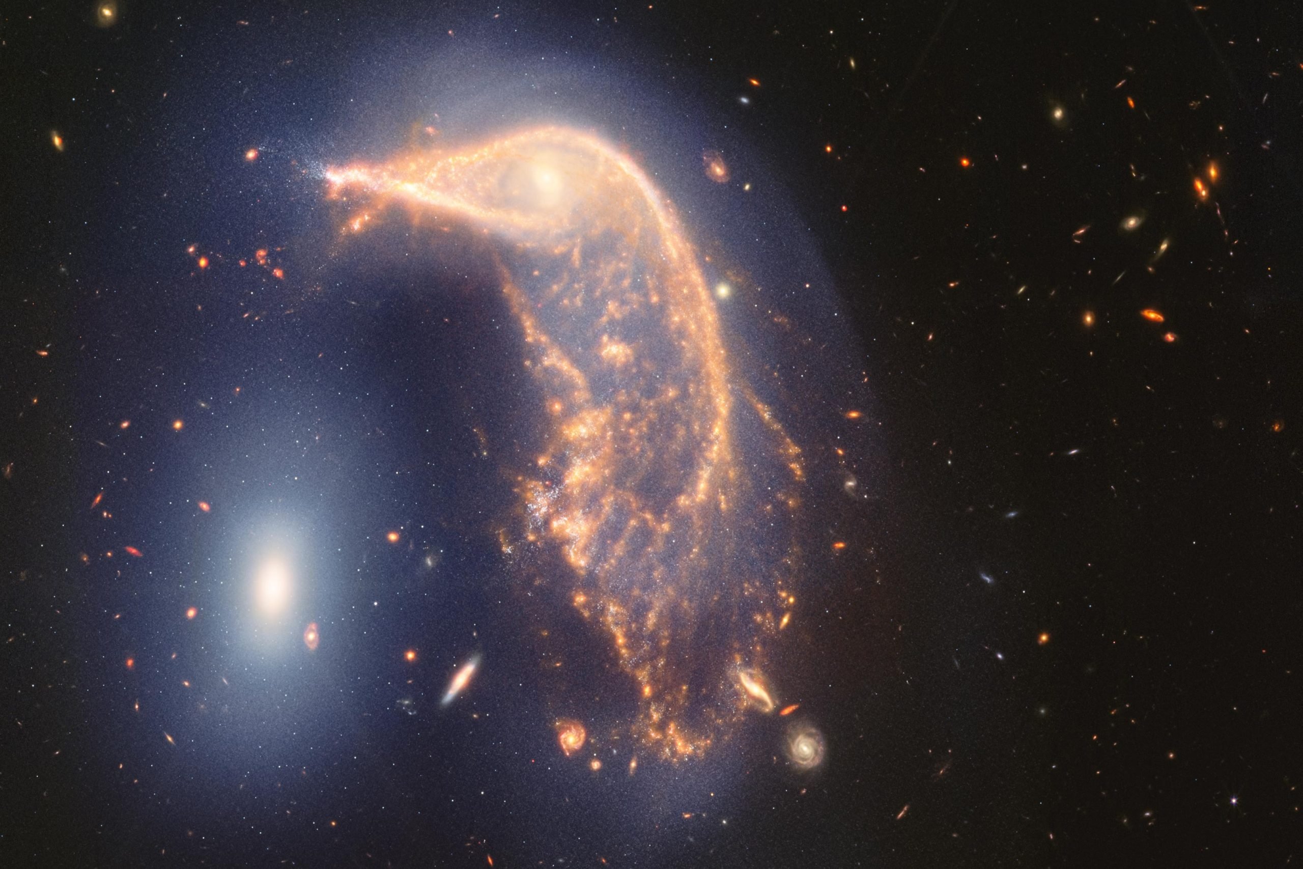 You are currently viewing Cosmic Penguin Party: Webb celebrates two years with a spectacular view of interacting galaxies