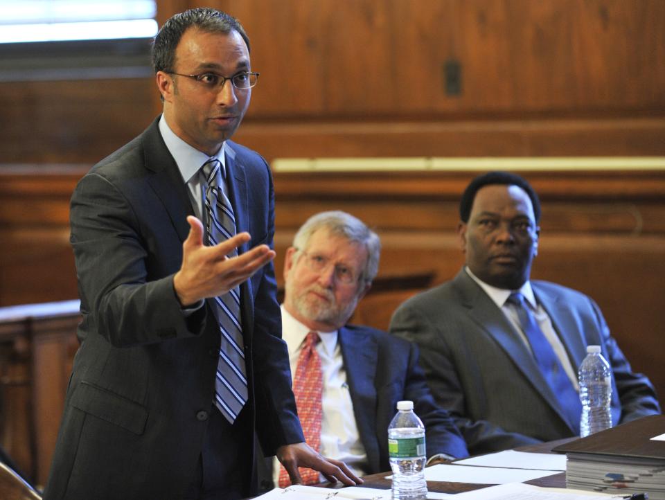 Attorneys for Dominique Strauss-Kahn, Amit Mehta (L), William Taylor (R) and Hugh Campbell present their case in the Strauss-Kahn v. Nafisatu Diallo case in New York State Supreme Court in the Bronx on March 28, 2012 in New York .  A lawyer for Dominique Strauss-Kahn asked a US judge on Wednesday to throw out a civil suit brought by a New York hotel maid, saying the disgraced French politician had diplomatic immunity when he allegedly assaulted her.  The suit 