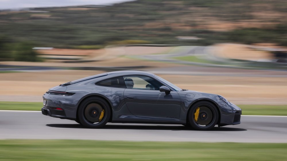 Driving the hybrid Porsche 911 Carrera GTS on the track.